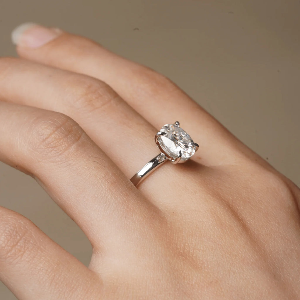 Side View of Four-Prong Moissanite Ring