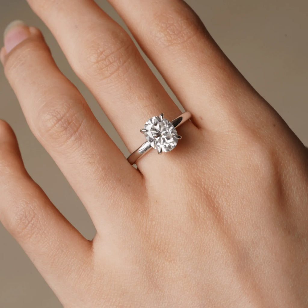 Four-Prong Oval Cut Moissanite Ring in Sterling Silver