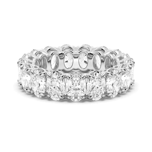 Timeless Wedding Band with Oval Moissanite