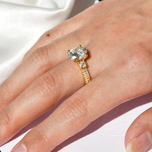 Three-Stone Oval Cut Moissanite Engagement Ring with Double Row Pavé Band