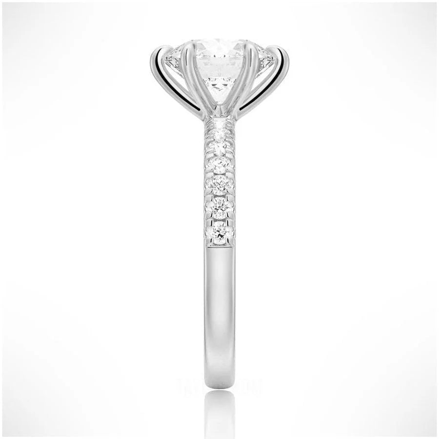 Brilliant Round Cut Moissanite in Secure Setting