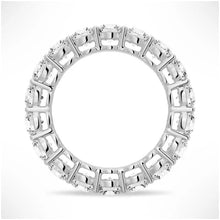 Load image into Gallery viewer, Lab-Created Moissanite Eternity Ring in White Gold on Hand
