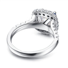 Load image into Gallery viewer, Closeup of Sapphire Halo Cushion Ring