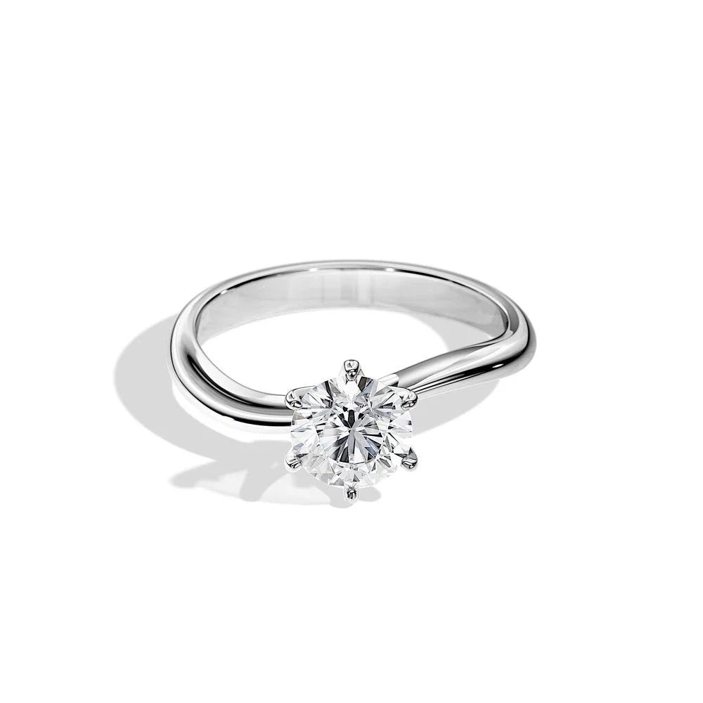 Minimalist Wave Band Moissanite Ring in Platinum