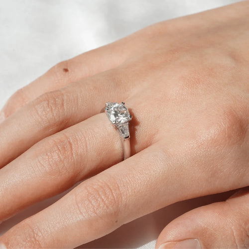Elegant Three-Stone Moissanite Ring Close-Up