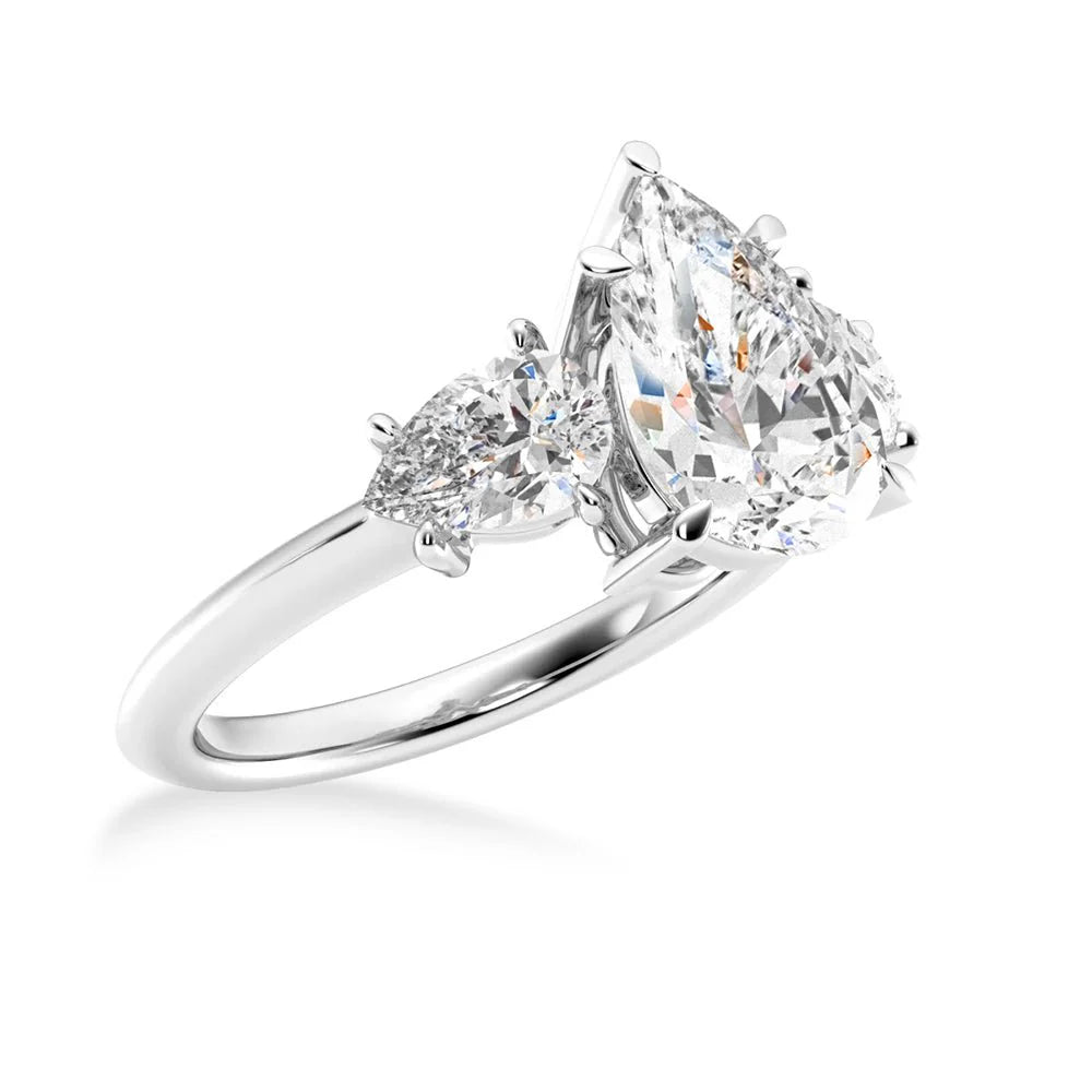 Romantic Pear Cut Engagement Ring with Side Stones