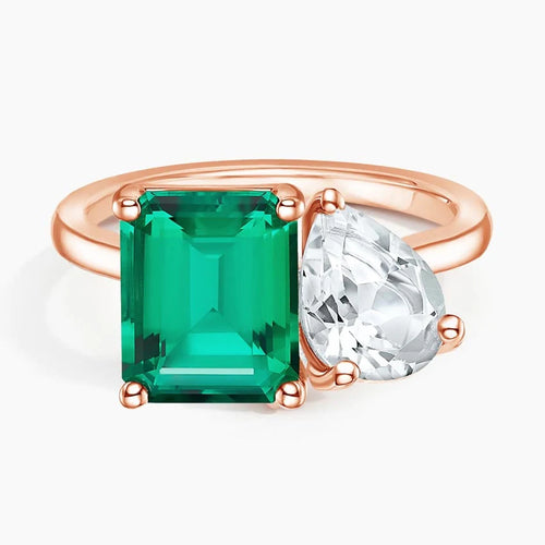 Rose gold Toi et Moi pear and emerald moissanite ring